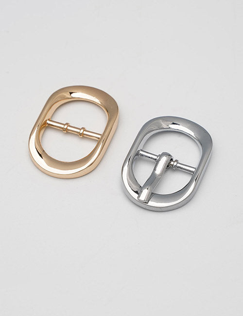 Two oval Buckles from YIPAI, one gold and one silver, are displayed side by side on a plain light gray background.