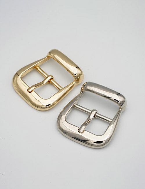 Two YIPAI Buckles on a white background—one in shiny gold, the other in shiny silver. Both metal buckles have a rectangular shape with rounded edges.