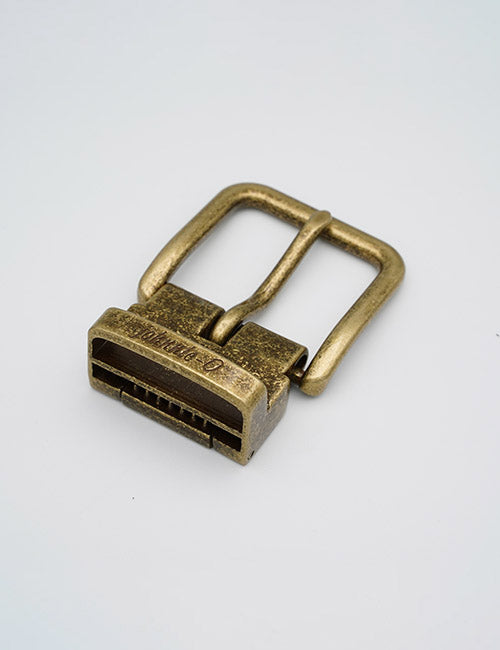 The YIPAI Buckles vintage brass single prong belt buckle is shown on a plain white background.