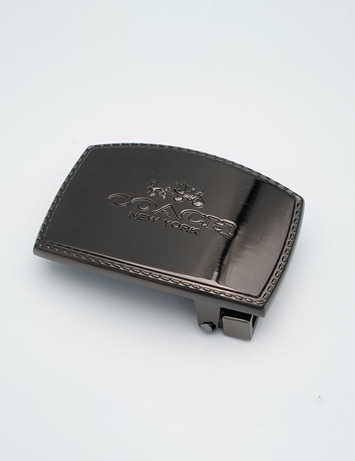 A black, rectangular metal belt buckle from YIPAI with the brand name engraved, displayed on a plain white background.