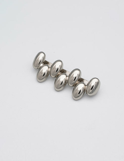 Six shiny, oval-shaped Buckles by YIPAI are arranged in two rows of three on a plain white background.