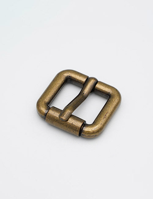 A YIPAI Buckles square-shaped, antique brass belt buckle with a single prong displayed on a plain, light background.