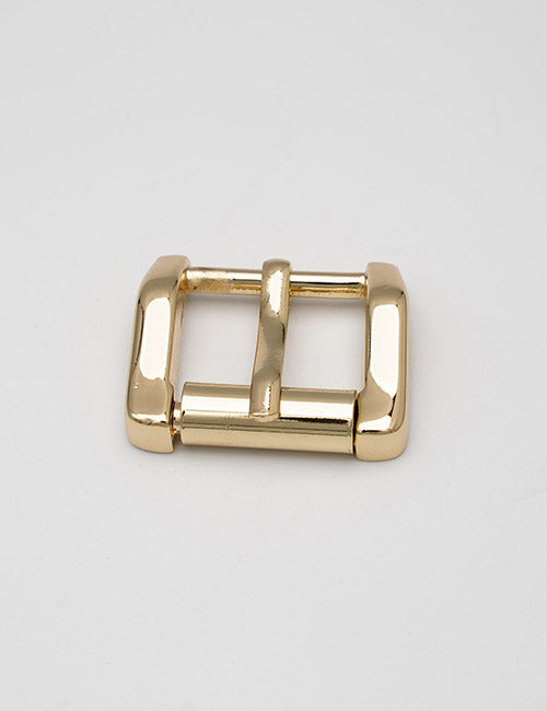 A shiny, rectangular gold YIPAI Buckles belt buckle with a central prong is displayed on a plain light gray background.