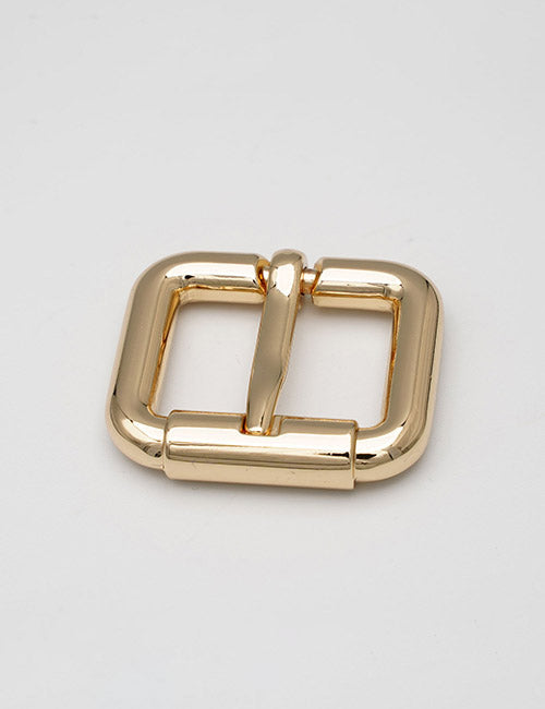 A shiny, gold-colored, square metal buckle with rounded corners and a central prong from YIPAI Buckles is displayed on a plain light gray background.