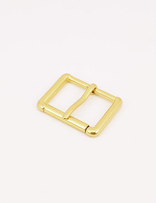 A YIPAI Buckle, rectangular and gold with rounded edges, lies flat on a plain white background.