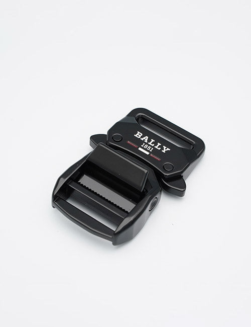 A black metal YIPAI buckle with the brand name printed in white and red on the upper part, displayed on a plain white background.