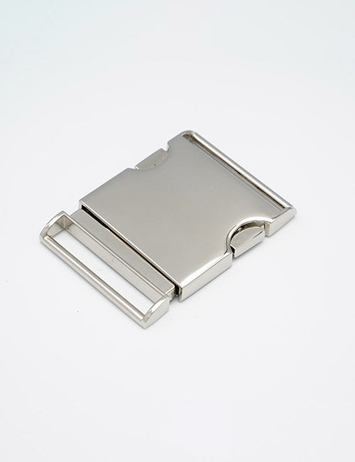 The YIPAI Buckles is a sleek, silver metal belt buckle with a rectangular, minimalistic design, clean lines, and a polished finish, showcased on a plain white background.
