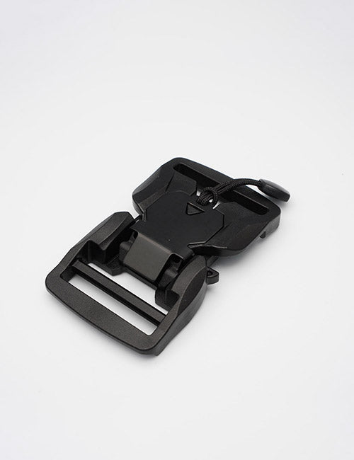 A close-up of a YIPAI Buckles black plastic side-release buckle with a cord lock, shown against a plain white background.