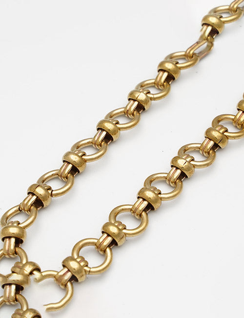 Two YIPAI Chains with interlocking circular links and decorative accents are displayed diagonally on a white background.