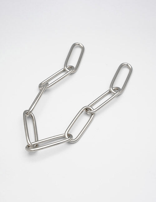 Three YIPAI Chains products, each resembling a large metallic paperclip, are interlinked and arranged in a triangular shape on a plain white background.