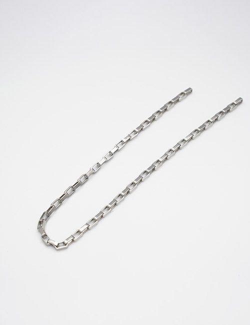 The YIPAI Chains silver rectangular link necklace is shown on a plain white background, gently curving near the bottom left.