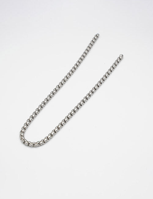 The YIPAI Chains necklace features interlocking silver links, displayed in a loose, curved shape against a plain white background.