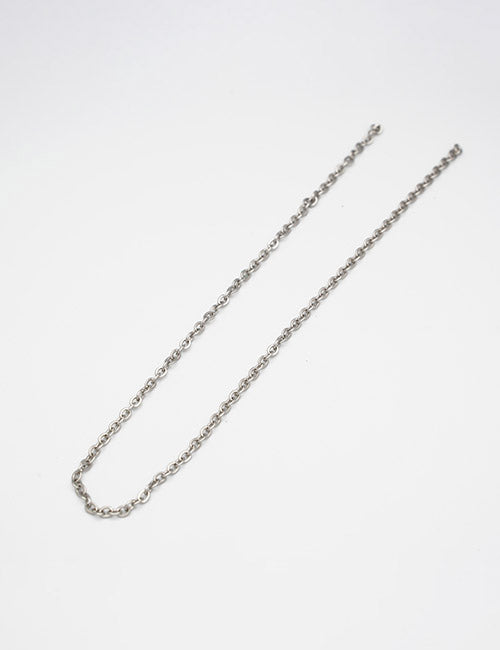 The YIPAI Chains necklace features small, evenly sized silver links and is displayed in an open curve on a plain white background.