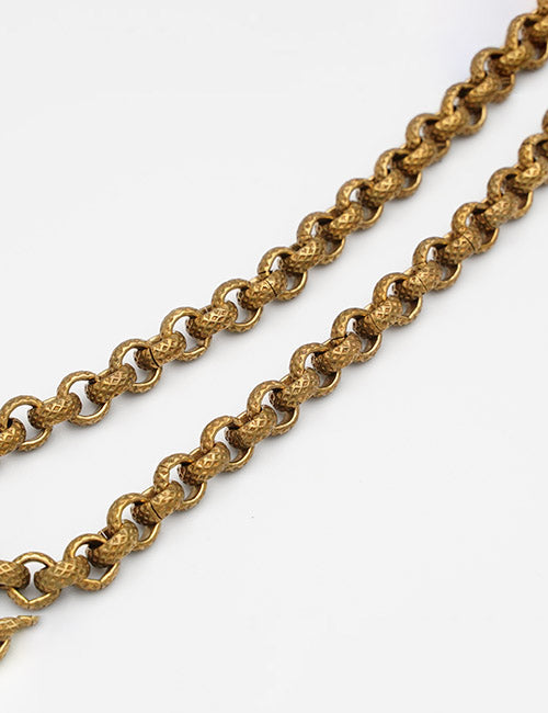 Close-up view of two YIPAI Chains featuring textured gold, round interlocking links, set against a plain white background.
