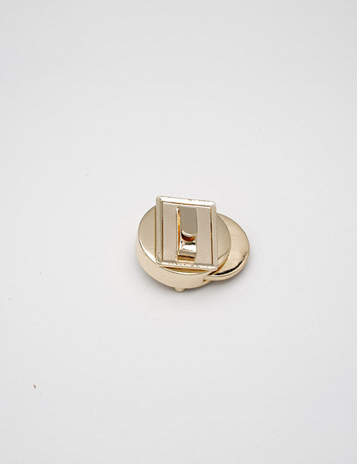 The YIPAI Closures features a gold rectangular metal clasp with a cut-out center, set on a round gold base, displayed on a plain white background.