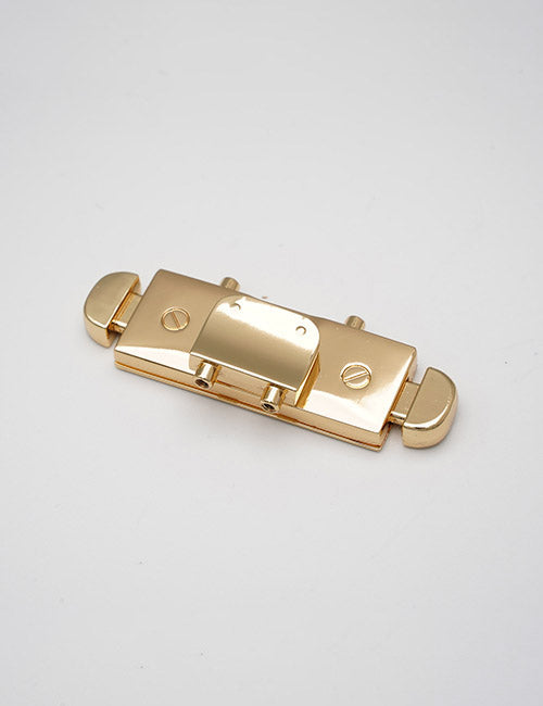The YIPAI Closures is a gold rectangular metal clasp with rounded ends and two small screws, displayed on a plain white background.