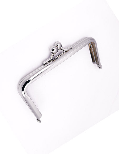 The YIPAI Closures silver metal purse frame features a round closure knob and is shown angled on a white background.