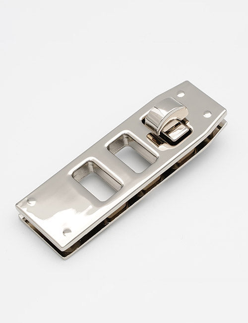 The YIPAI Closures metallic sliding latch lock features three rectangular cutouts and a small rotating clasp on one end, finished in polished metal and displayed against a plain white background.