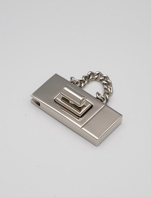 The YIPAI Closures is a rectangular metal security door chain lock with a shiny finish and a short linked chain on one side, placed on a plain light gray background.