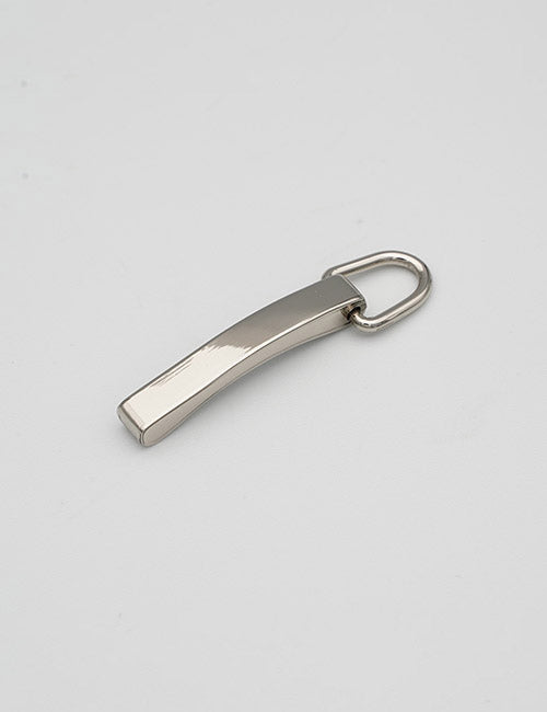 A close-up of a YIPAI Fasteners metallic keychain with a rectangular, slightly curved body and a rounded keyring on a plain light gray background.
