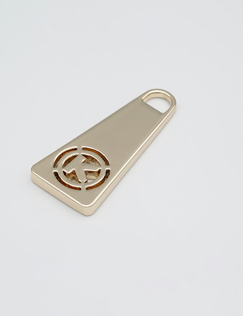 The YIPAI Fasteners is a gold metal keychain shaped like a flat wedge with a circular geometric cutout near the wider end, shown on a plain white background.