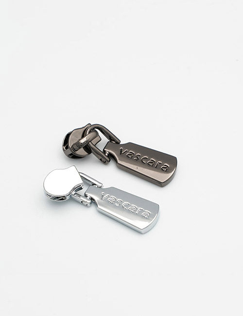 Two metallic Fasteners by YIPAI, one silver and one gunmetal, each engraved with the brand name, are displayed side by side on a plain white background.