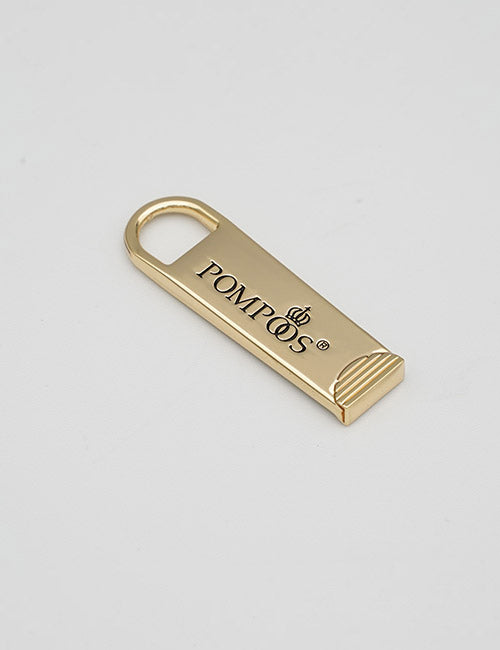 A gold-colored rectangular fastener with a rounded loop end, featuring the brand name YIPAI printed in black on the top.