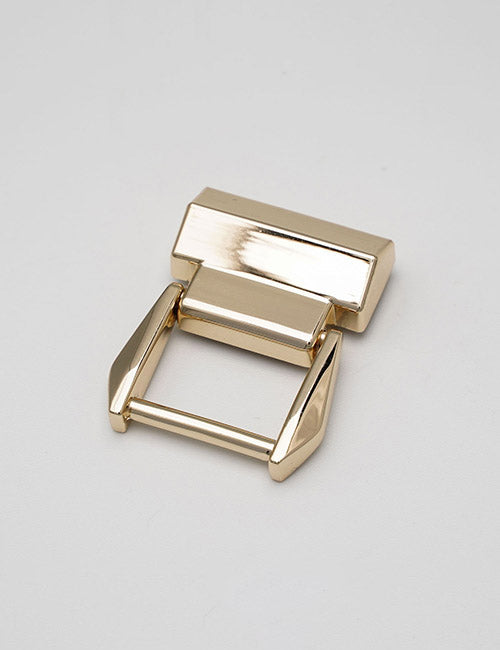 The YIPAI Handles product is a shiny, rectangular gold accessory with angular edges and a central bar, displayed on a plain light gray surface.