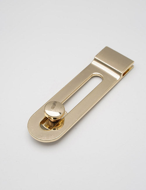 The YIPAI Handles is a gold-colored metal money clip with a sleek rectangular design, rounded end, and central screw for adjustment, displayed on a plain white background.