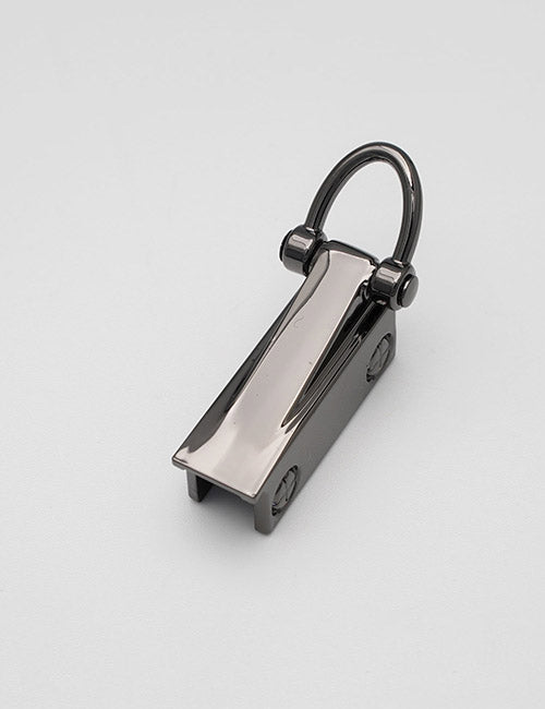 The YIPAI Handles feature a shiny metallic clasp with a curved loop and rectangular base, polished to a reflective finish. Its industrial design stands out against a plain light gray background.