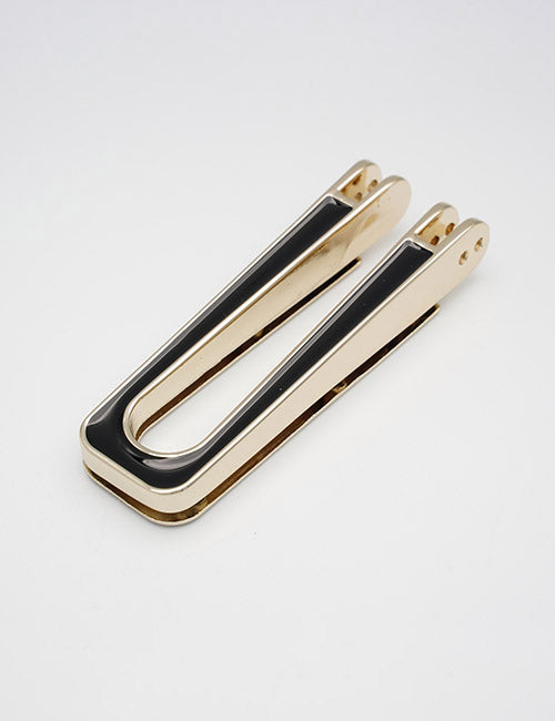 The YIPAI Handles money clip features a gold metal finish with a black enamel accent in an elongated U shape, displayed on a plain white background.