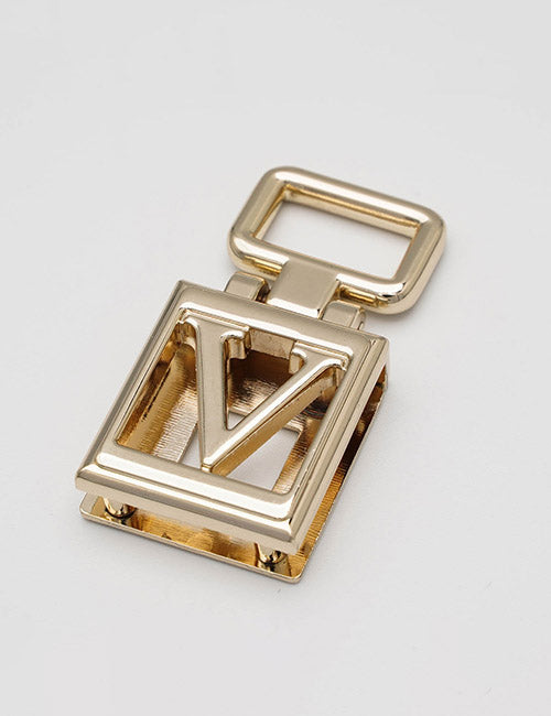 The YIPAI Handles feature a gold metal clasp with a rectangular base and cutout letter V, plus a matching rectangular loop at the top, showcased on a plain white background.