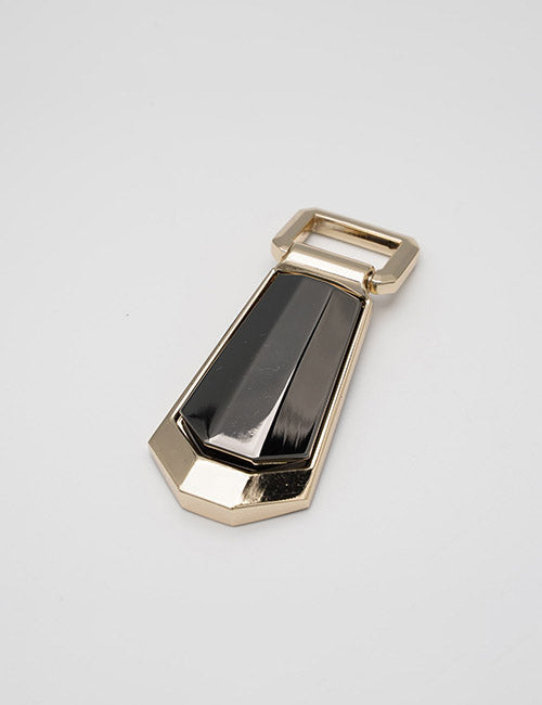 The YIPAI Handles feature a gold and black geometric, angular design with a rectangular loop at the top and glossy black inlay, shown against a plain white background.