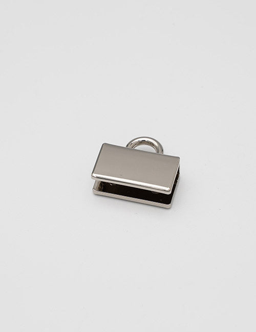 A small, rectangular silver YIPAI Handles clasp with a top loop rests on a plain white background.