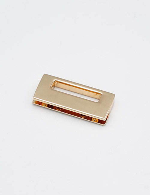A small, rectangular YIPAI Handles product in gold with a hollow center cutout, shown on a plain white background.