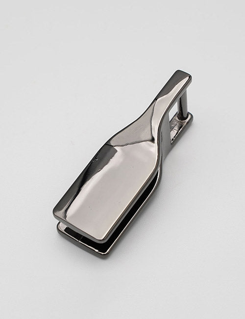 A metallic YIPAI Handles tie clip shaped like a wine bottle, displayed on a plain light gray background.