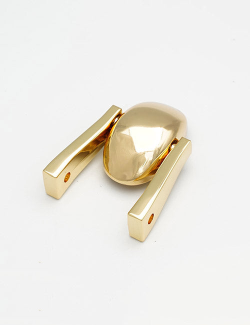 A YIPAI Handles product, gold-colored with an oval center and two straight, parallel arms featuring small holes at the ends, is displayed on a plain white background.