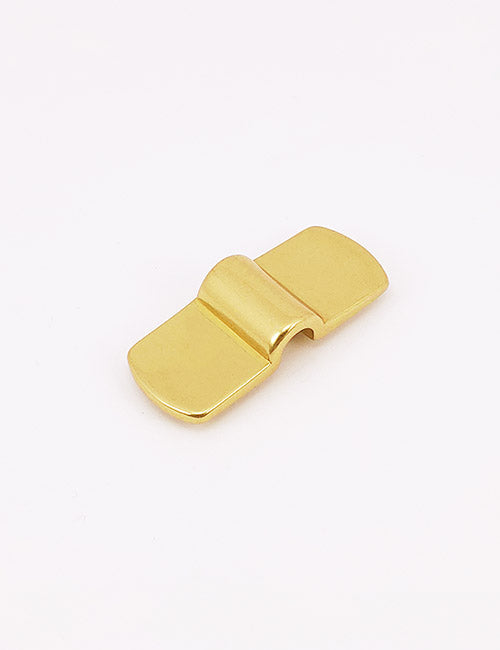 A small gold-colored metal YIPAI handle with two flat rectangular wings and a raised center ridge, shown on a white background.