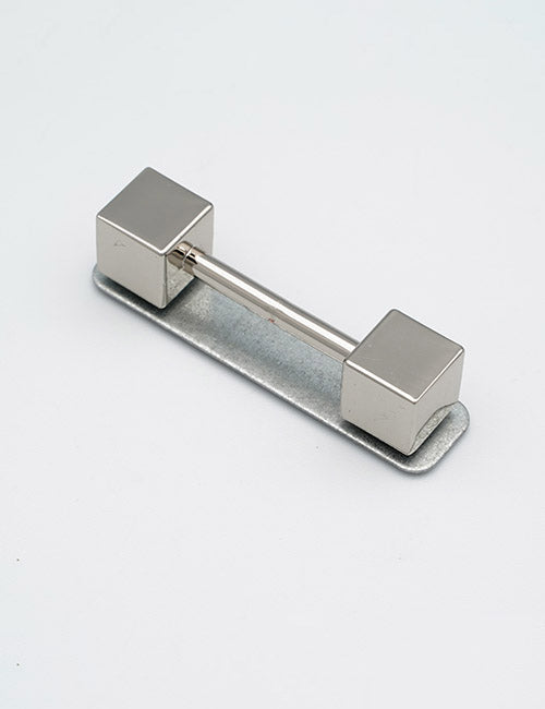 The YIPAI Handles feature two square metal blocks linked by a short rod, mounted on a flat oval base, all in sleek silver, shown against a plain white background.