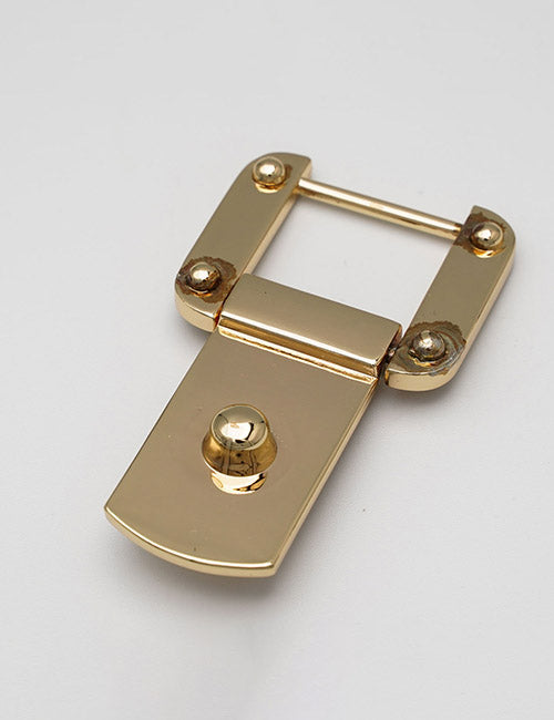 The YIPAI Handles feature a shiny gold metal buckle with a rectangular hinge, four round corner studs, and a flat, curved clasp, displayed against a plain white background.