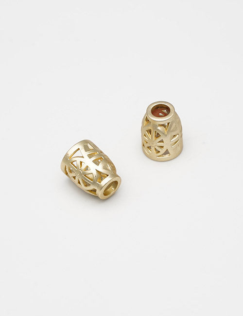 Two small, gold-colored YIPAI Handles with geometric cutout patterns are displayed on a plain white background.