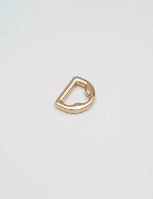The YIPAI Rings & Slides features a small, gold-colored metal D-ring clasp displayed flat on a plain white background.