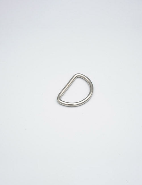 A single YIPAI Rings & Slides silver metal D-ring is centered on a plain white surface.
