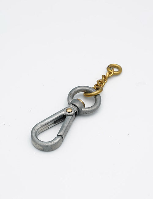 The YIPAI Rings &Slides features a metal carabiner clip attached to a short gold chain ending with a round gold ring, shown on a plain white background.