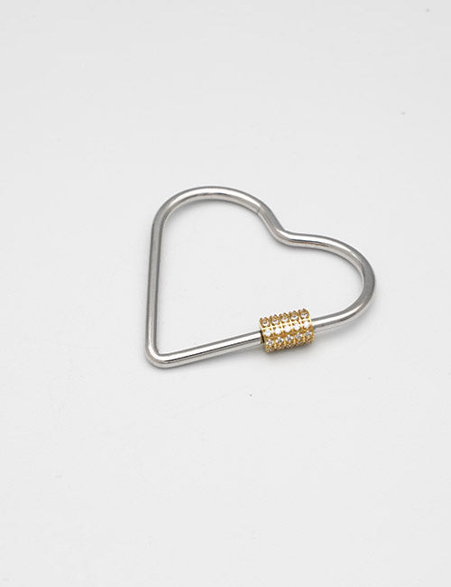 The YIPAI Rings & Slides features a silver metal heart-shaped carabiner with a textured gold clasp, displayed on a plain white surface.