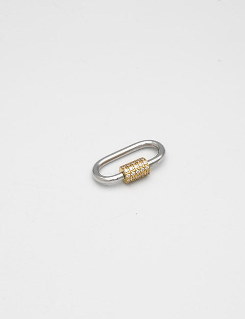 The YIPAI Rings & Slides features a small, oval-shaped metal link with a textured gold center section, displayed against a plain white background.