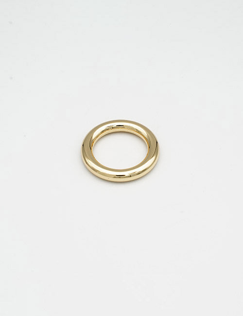 A minimalist, shiny gold Rings & Slides ring by YIPAI is centered on a plain white background.