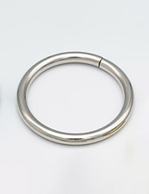 The YIPAI Rings & Slides is a silver metal circular keyring with a small gap, shown lying flat on a plain light background.