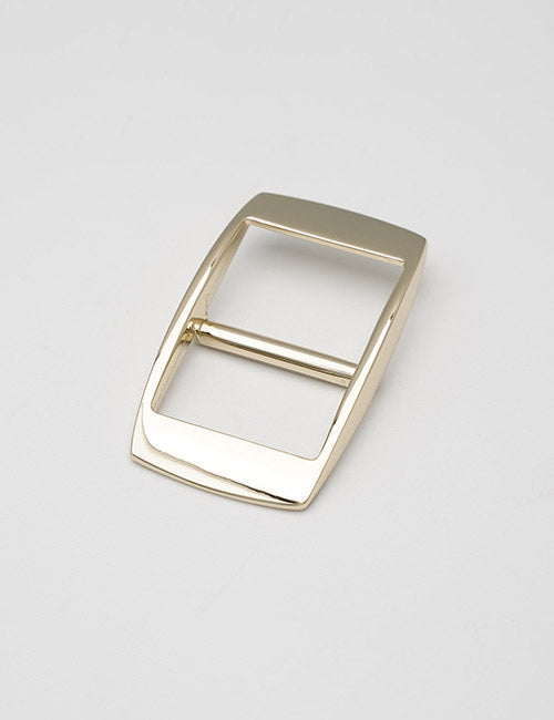 A shiny, rectangular gold Rings & Slides belt buckle by YIPAI with a central bar and prong, displayed on a plain white background.