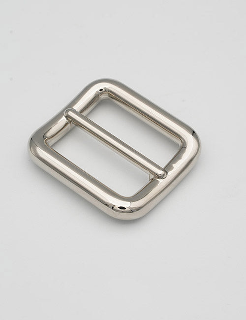 A square, shiny silver YIPAI Rings & Slides metal belt buckle with rounded edges and a central bar, set against a plain light gray background.